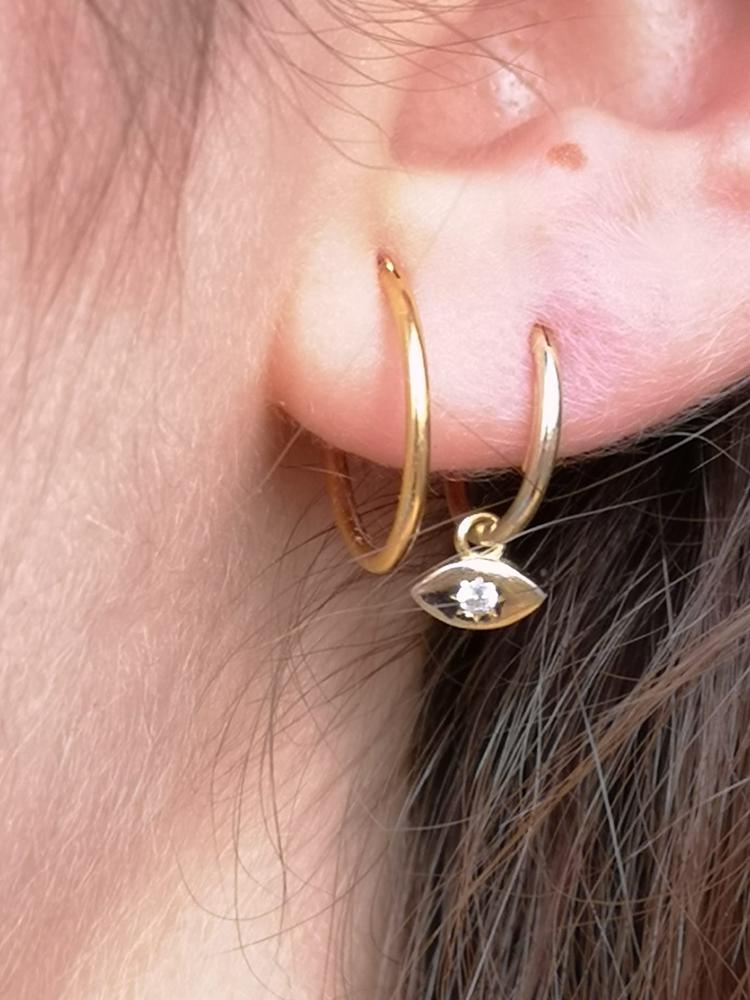 PAR DE ARITOS OJOS CON CIRCONITA
